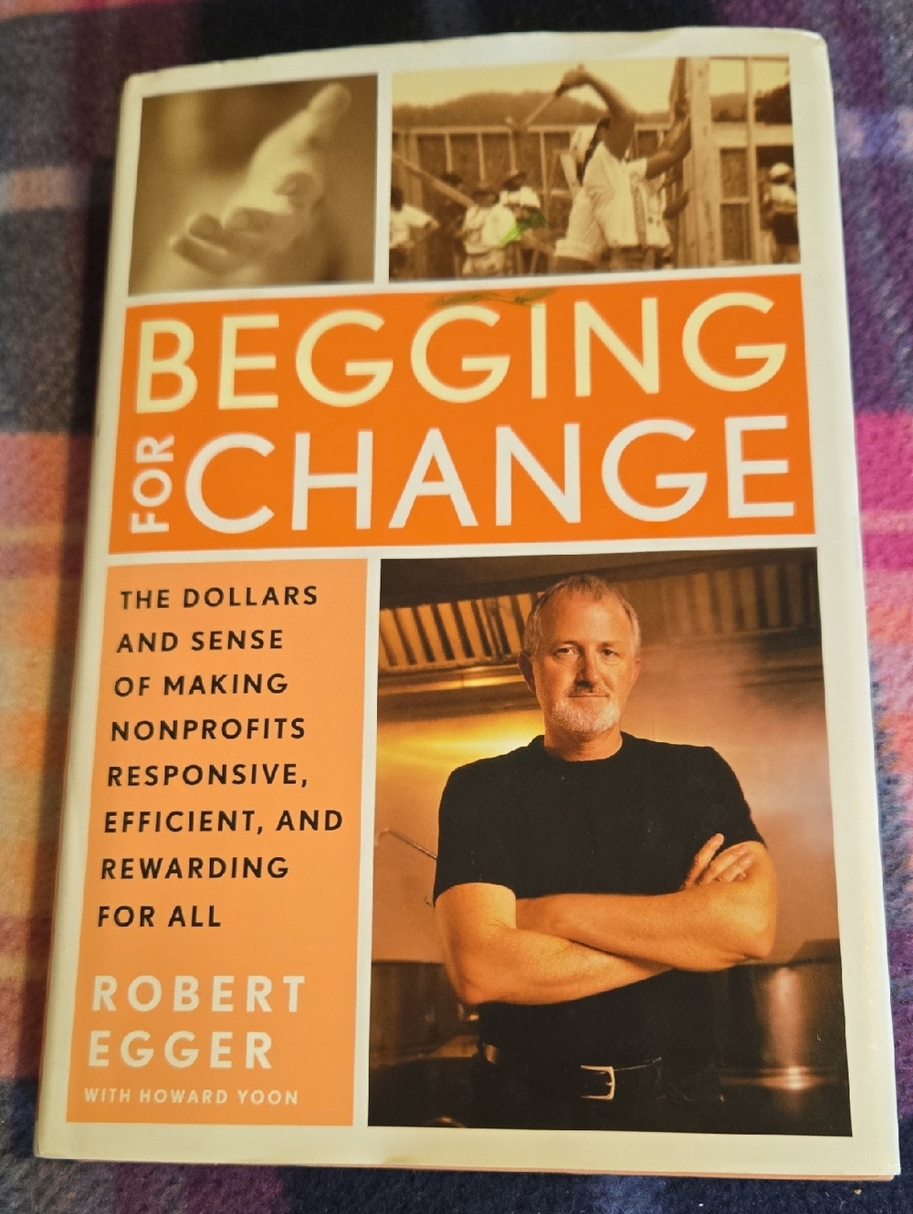Begging for Change by Robert Egger - Orange & White Hardcover